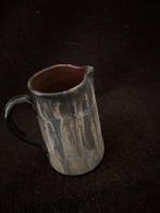 Keramieken kan, Ophalen