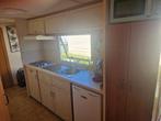 Sta caravan te huur aan zee, Wasmachine, Aan zee