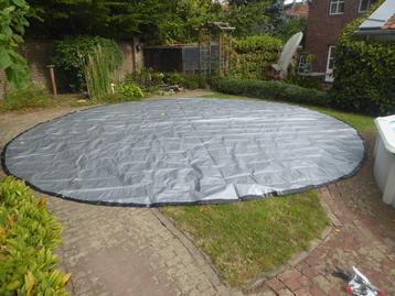 Te koop nieuw winter afdekzeil voor zwembad rond 560 cm beschikbaar voor biedingen