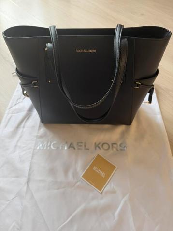 Michael Kors beschikbaar voor biedingen