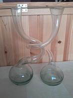 2 kronkelende vaasjes., Enlèvement