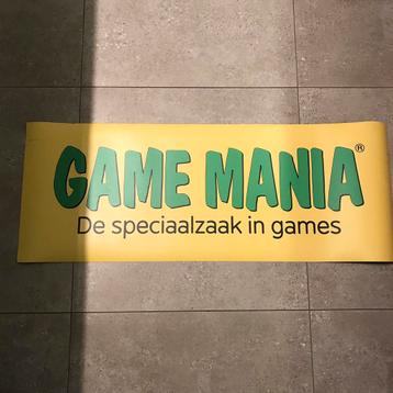 Grand aimant publicitaire original de la marque Gamemania.  disponible aux enchères