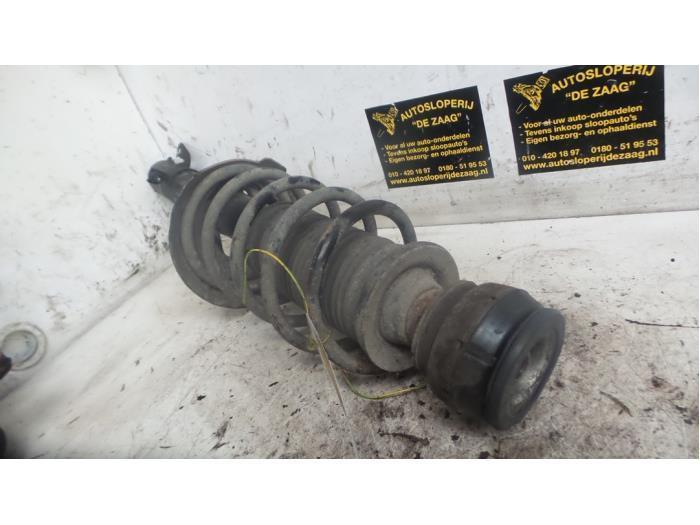 Schokdemperpoot rechts-voor van een Volkswagen Golf, Auto-onderdelen, Ophanging en Onderstel, Volkswagen, Gebruikt, 3 maanden garantie