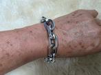 Schakel armband, Ophalen