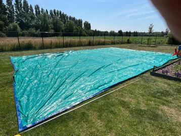 Blauw dekzeil met zeilringen 11,5 x 7,75 m in perfecte staat beschikbaar voor biedingen
