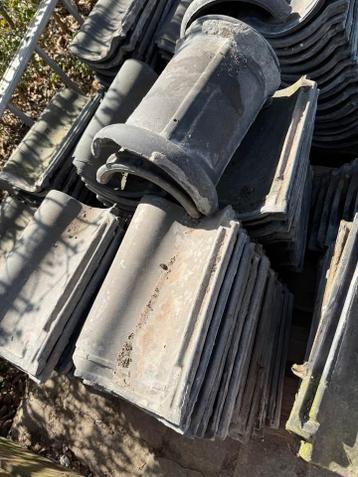 Zwarte dakpannen 12m²