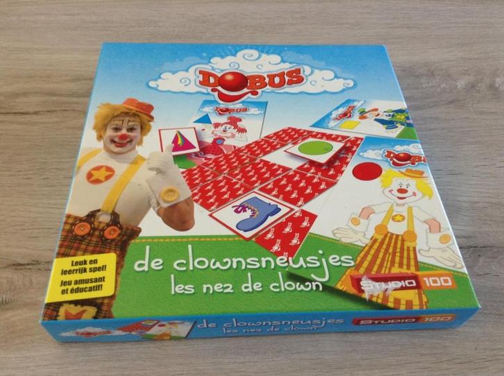 Studio 100 Dobus clownsneusjes gezelschapspel, Hobby en Vrije tijd, Gezelschapsspellen | Kaartspellen, Zo goed als nieuw, Drie of vier spelers