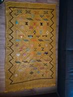 Handgewoven Berbers tapijt, Ophalen