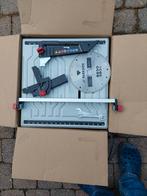 Tegelzaagmachine, Ophalen