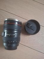 Thermosbeker zoomlens, Ophalen