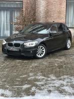 BMW 1-serie F20 116i Benzine Automaatpakket M Euro 6, Auto's, BMW, Automaat, 1 Reeks, Euro 6, Zwart