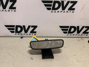 Binnenspiegel van een BMW M5 beschikbaar voor biedingen