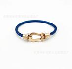 Fer a cheval or rose et bleu, Handtassen en Accessoires, Armbanden, Ophalen of Verzenden, Nieuw, Blauw, Staal