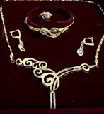 Parure 18 carats, Handtassen en Accessoires, Bedels, Ophalen of Verzenden, Zo goed als nieuw, Goud, Overige merken