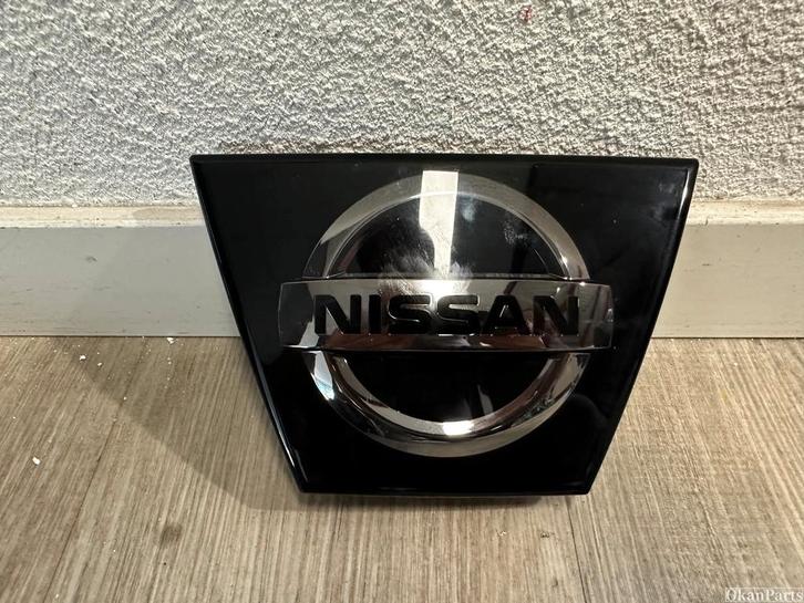 Nissan Micra Embleem Logo 62890-5FA0B, Auto-onderdelen, Carrosserie, Nissan, Voor, Gebruikt