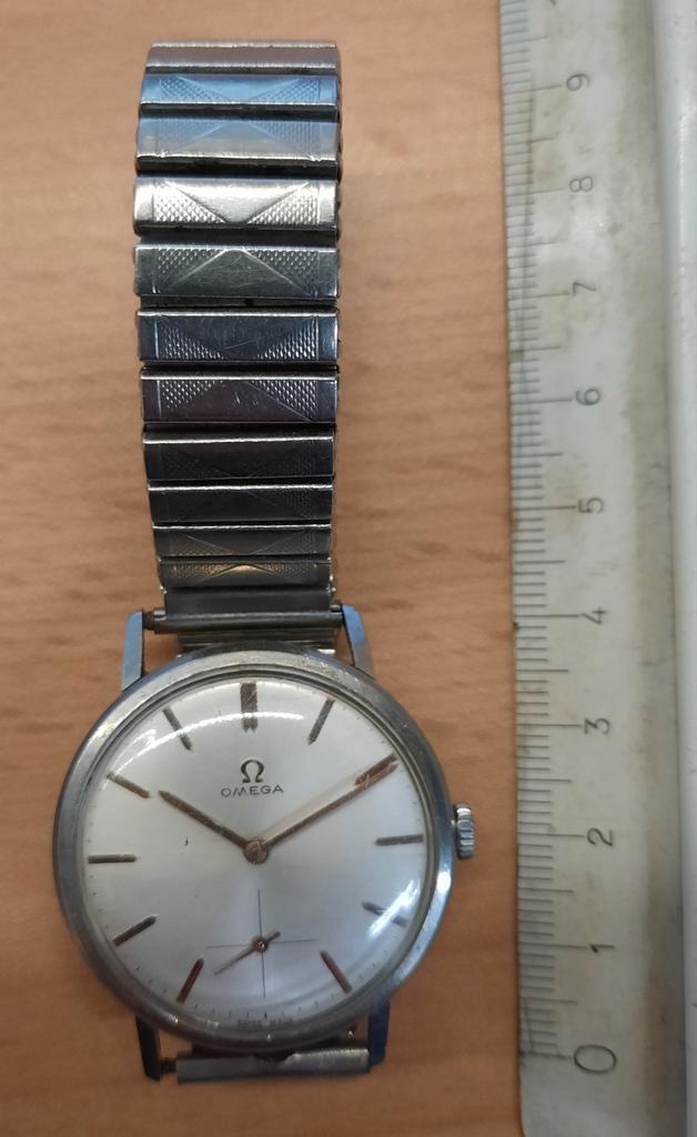 Omega horloge 121.002-63 uit 1963 Rouages 269, Handtassen en Accessoires, Horloges | Antiek, Polshorloge, Omega, Staal, 1960 of later