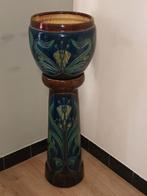 Antieke cache-pot en zuil, Enlèvement