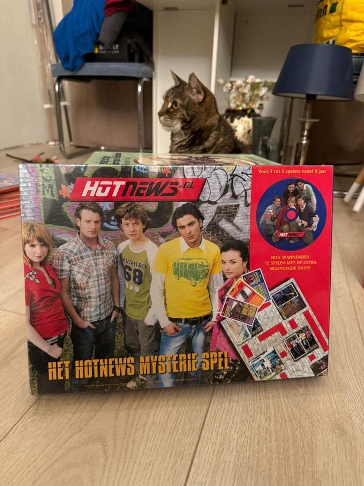 Het Hotnews Mysterie Spel – compleet en in goede staat, Hobby en Vrije tijd, Gezelschapsspellen | Bordspellen, Nieuw, Vijf spelers of meer