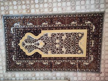 Tapijt in goede staat, 70cm x 115cm beschikbaar voor biedingen