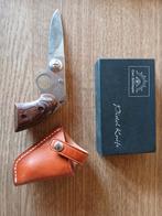 Mes Pistel knife jachtmes, Ophalen