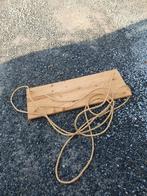 Grote schommel, Ophalen