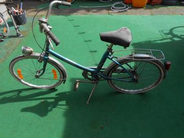 Peugeot oude mini fiets.