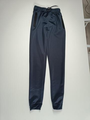 Joggingbroek blauw zwarte ritsen 158/164