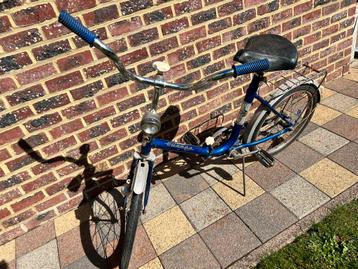 Vintage minifiets beschikbaar voor biedingen