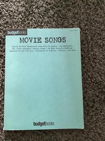 Movie songs partiturenboek easy piano beschikbaar voor biedingen