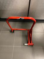 Paddockstand, Motoren, Ophalen