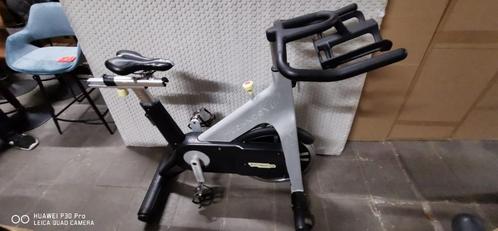 Technogym spinningfiets, Sport en Fitness, Fitnessapparatuur, Gebruikt, Spinningfiets, Armen, Benen, Borst, Buik, Rug, Metaal