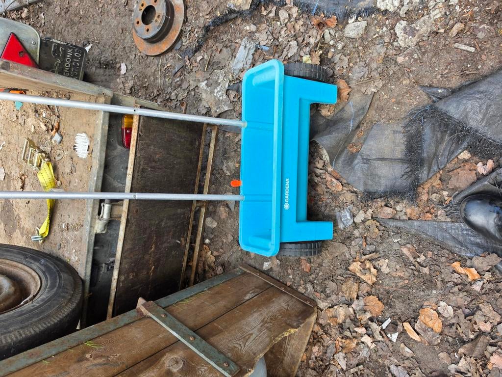 Mest of zaad strooi karretje, Ophalen