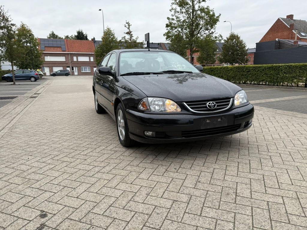 Toyota Avensis 1'6 benzine met weinig km, Auto's, Toyota, Avensis, 1600 cc, Handgeschakeld, 5 deurs