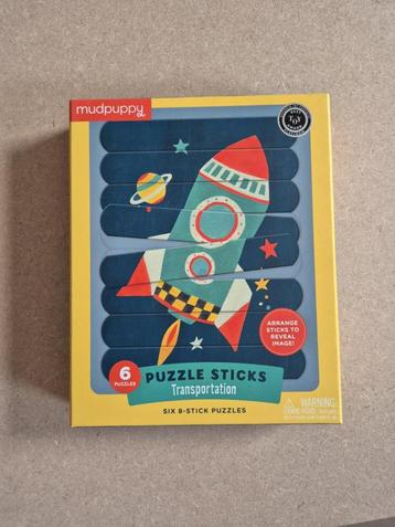 Puzzel sticks transport / Mudpuppy disponible aux enchères