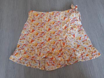 Geel/ oranje broekrokshortje Name It 146 beschikbaar voor biedingen