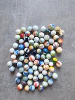 Gekleurde knikkers, Ophalen