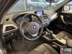 BMW 116 1-serie 116i Business+ | Airco | Cruise | Navi | PDC, Auto's, 1 Reeks, Bedrijf, Zilver of Grijs, 129 g/km