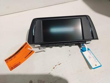 Display Multi Media regelunit van een BMW 1-Serie beschikbaar voor biedingen
