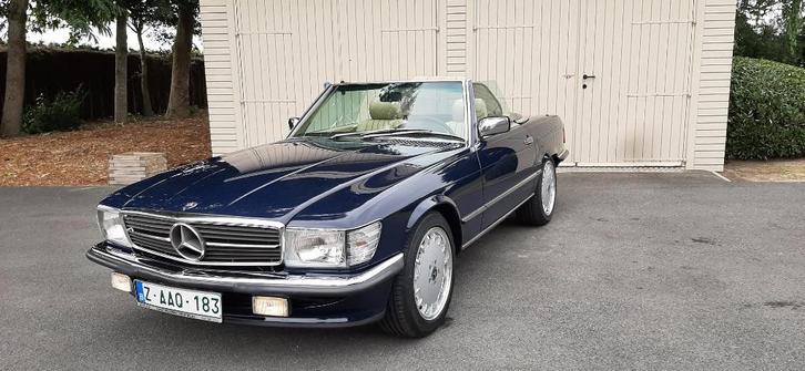 MERCEDES 560 SL V 8 .UNIEK IN NIEUWSTAAT EN OLDTIMER GEKEURD, Auto's, Mercedes-Benz, Bedrijf, Te koop, SL, ABS, Airbags, Airconditioning
