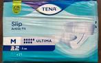 Tena Slip Active Fit Ultima M plastic folie, Ophalen of Verzenden, Zo goed als nieuw