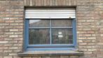 Houten kiepraam met geblurd glas, Ophalen