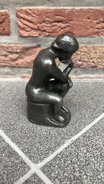 "De denker" van Rodin, Ophalen