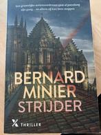 Thriller De strijder - Bernard Minier, Bernard Minier, Ophalen of Verzenden, Zo goed als nieuw