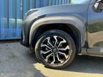 Toyota Yaris Cross 1.5 VVT-ie Hybrid 85kW Dynamic Plus CVT, Stof, Gebruikt, 750 kg, Zwart