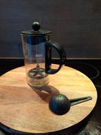 Koffiemaker Bodum, Enlèvement