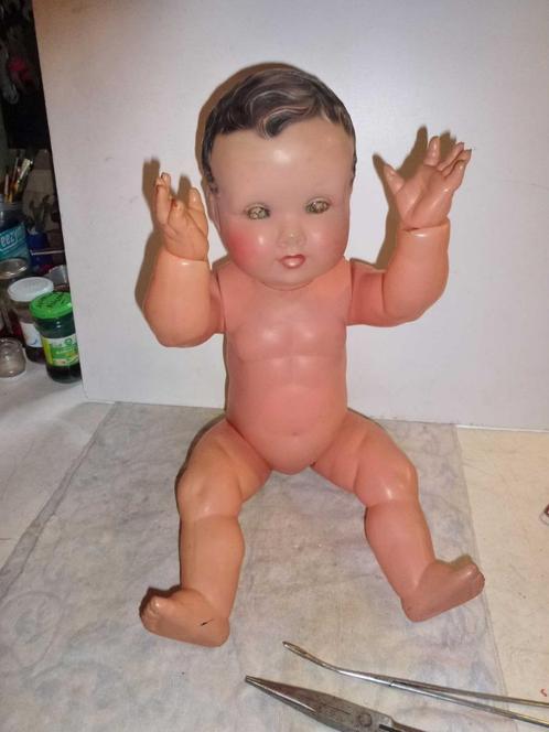 antieke pop van celluloid met 60 letters op de achterkant, Kinderen en Baby's, Speelgoed | Poppen, Gebruikt, Overige typen, Ophalen of Verzenden