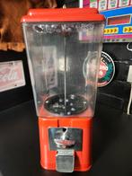 Kauwgomautomaat, Ophalen