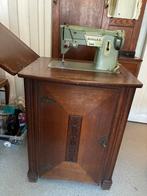 Antieke singer naaimachine kast, Enlèvement