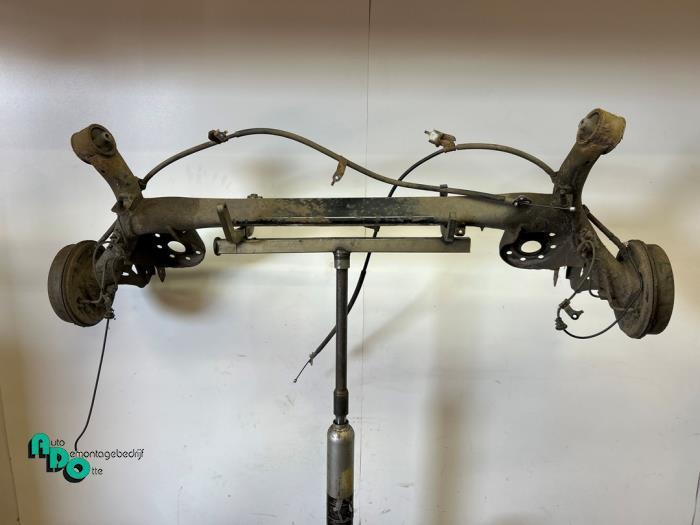 Achteras voorwielaandrijving van een Toyota Yaris (Yaris 2 0, Auto-onderdelen, Remmen en Aandrijving, Toyota, Gebruikt, 3 maanden garantie