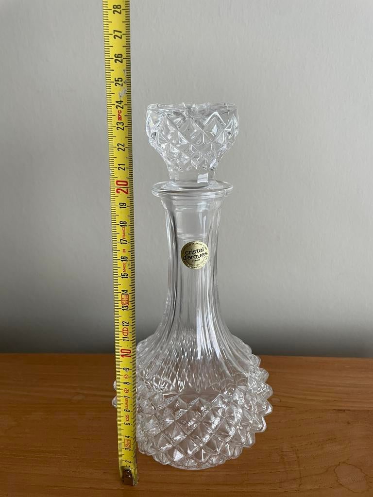 glazen karaf, Enlèvement